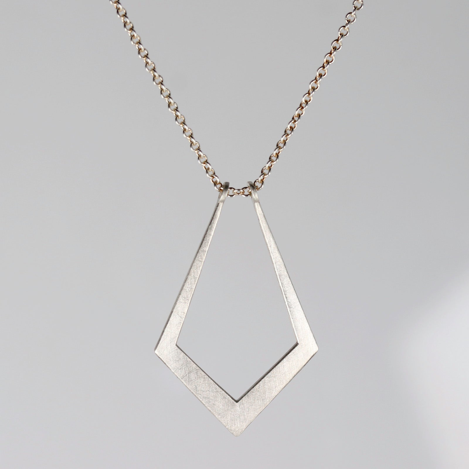. Silver Oblique Magic Ring Holder Necklace