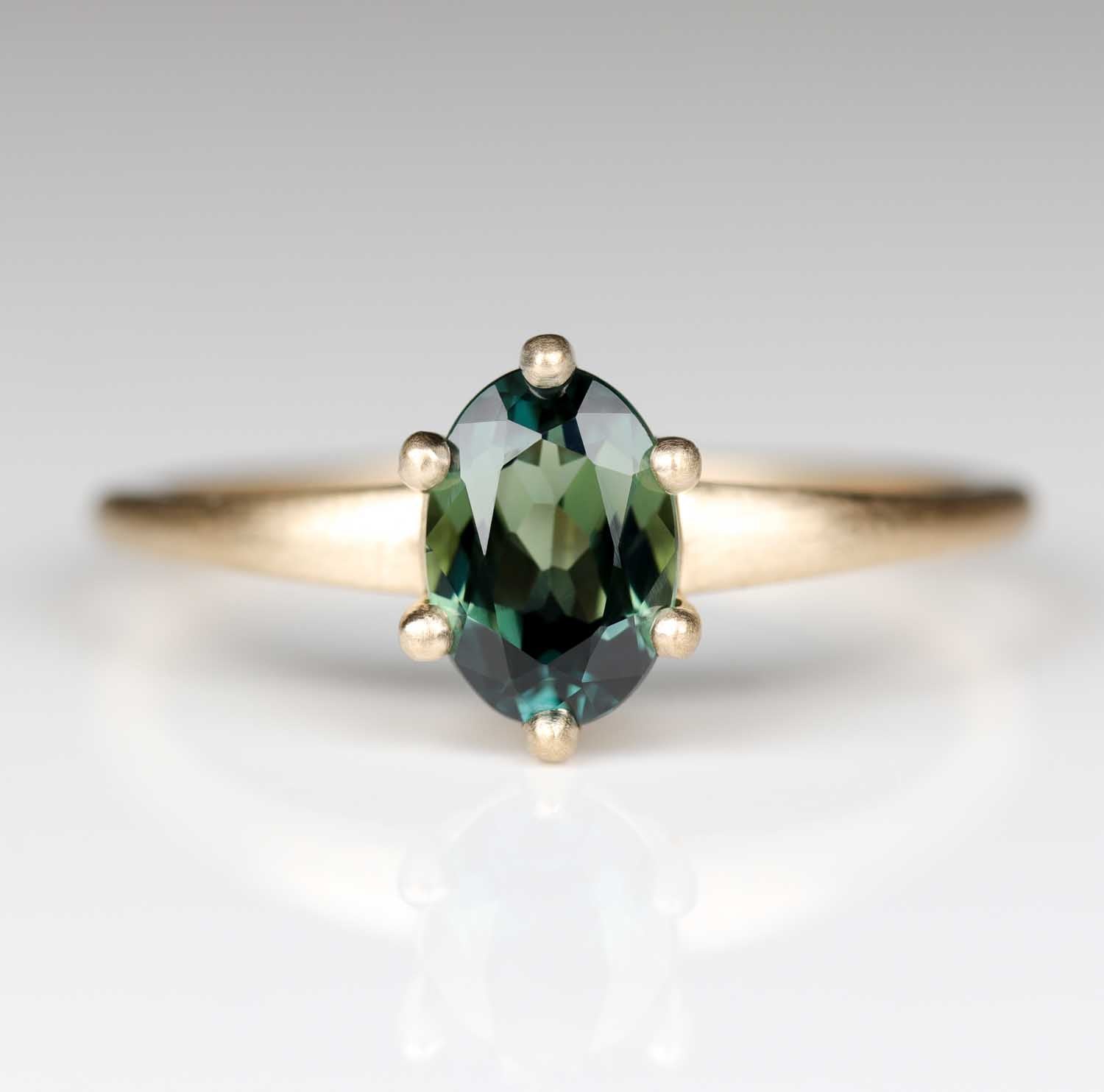 7x5mm Oval Australian Sapphire Six-Prong Solitaire Yellow Gold