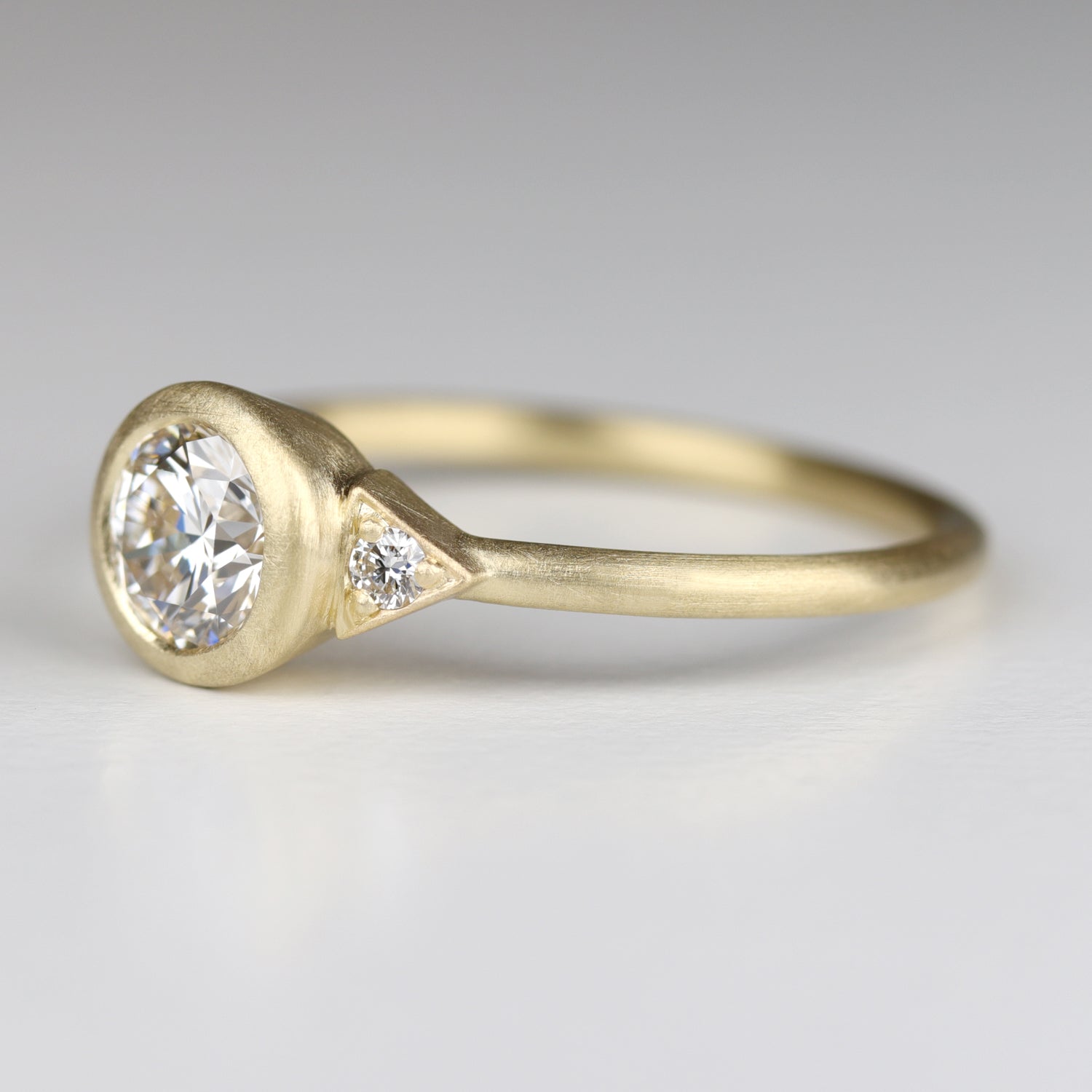 Deco Bezel Three Stone Ring with Diamond Foundry Stone