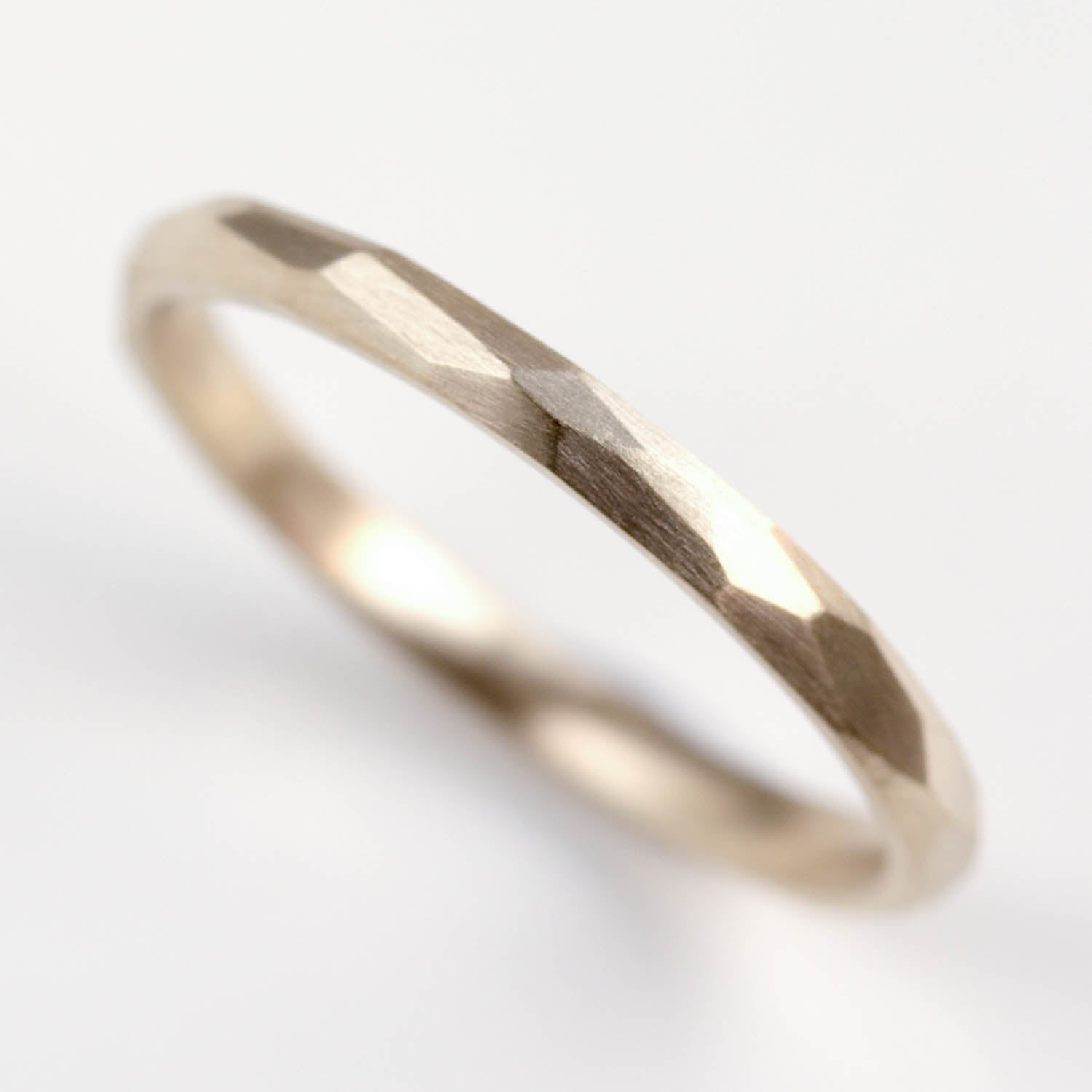 Narrow Faceted Wedding Band •