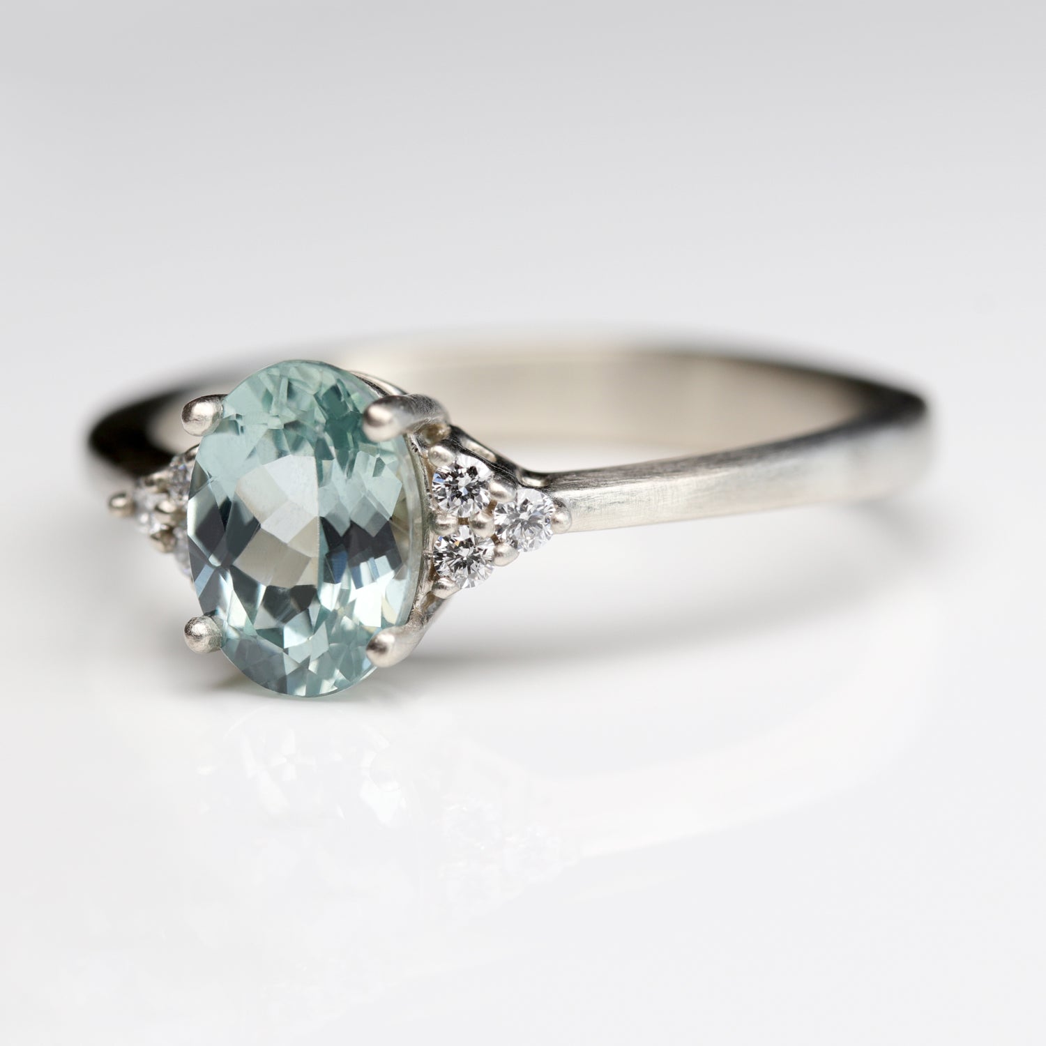 Seven Stone Basket Cluster Engagement Ring with Malawi Sapphire