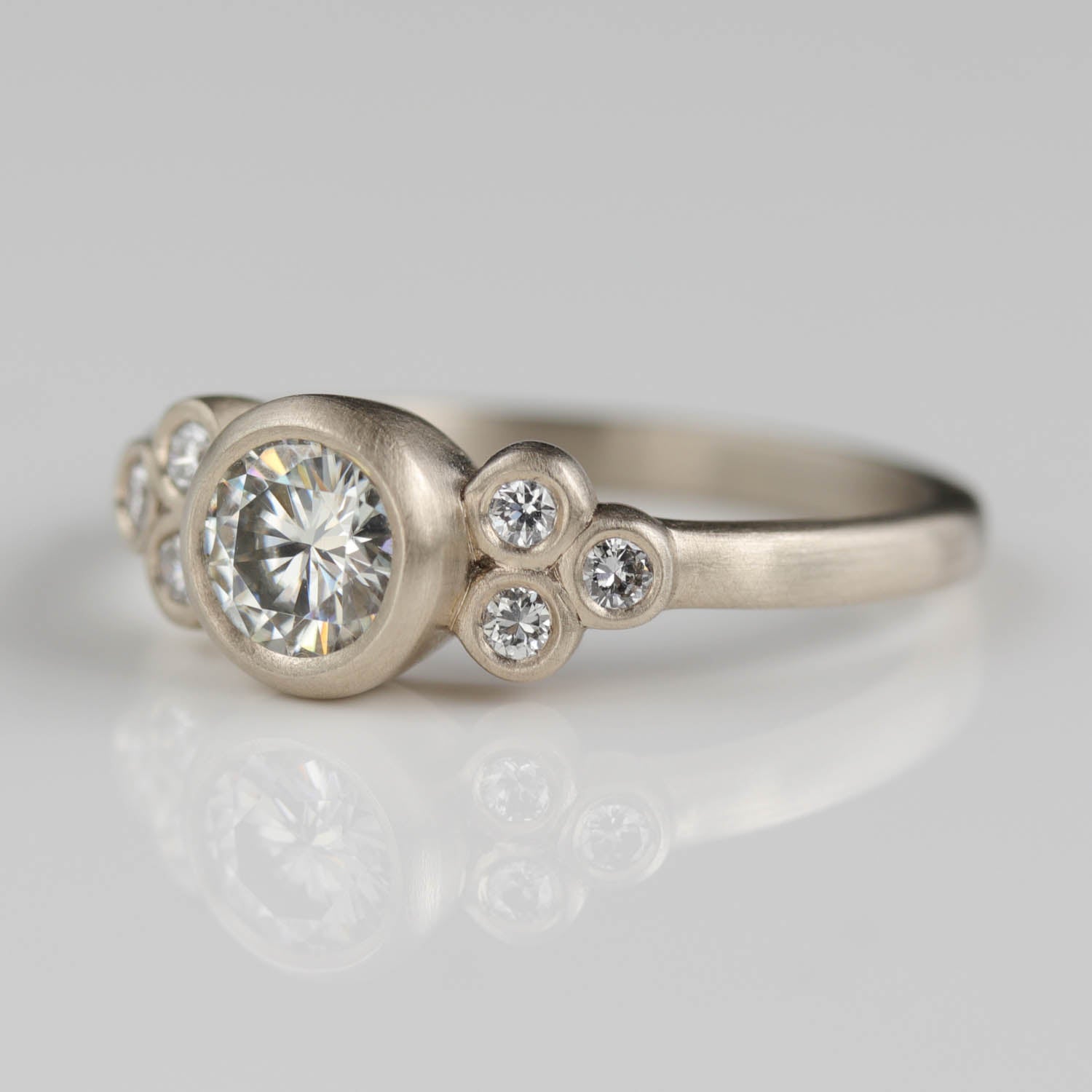 Bezel-set Seven Stone Cluster Ring •