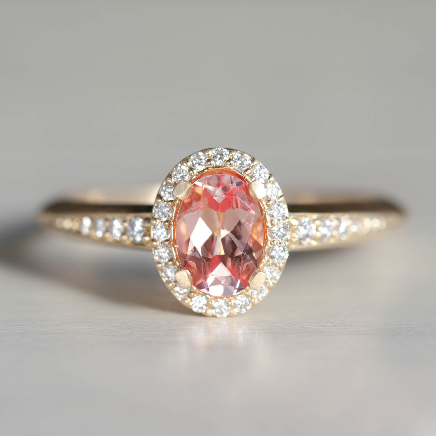 Oval Halo Solitaire with Peach Champagne Sapphire and Diamonds