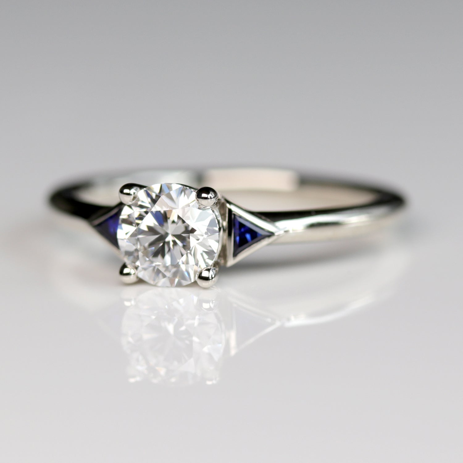Prong-set Deco Three Stone Ring with Blue Sapphire Side Stones